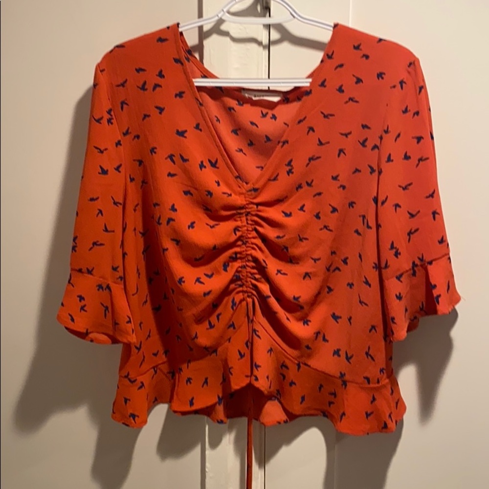 Gorgeous! Orange flattering top!